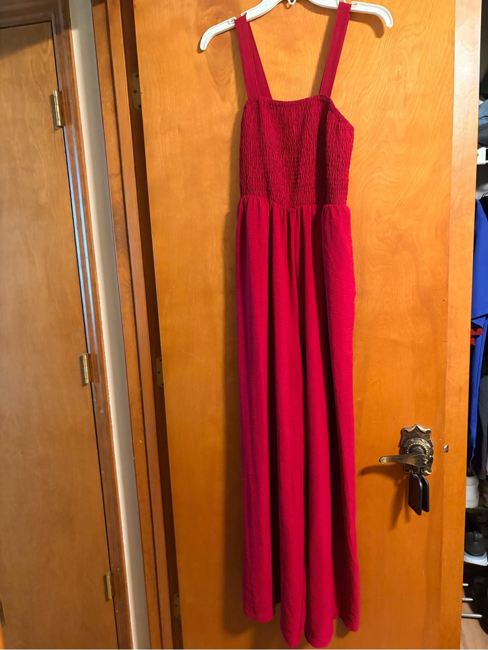 Stylish Red Jumpsuit with Smocked Bodice
